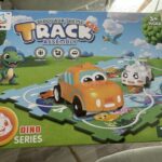 Pista de Autos Dinosaurio Armable – Puzzle Circuito con Auto 🦖🚗
